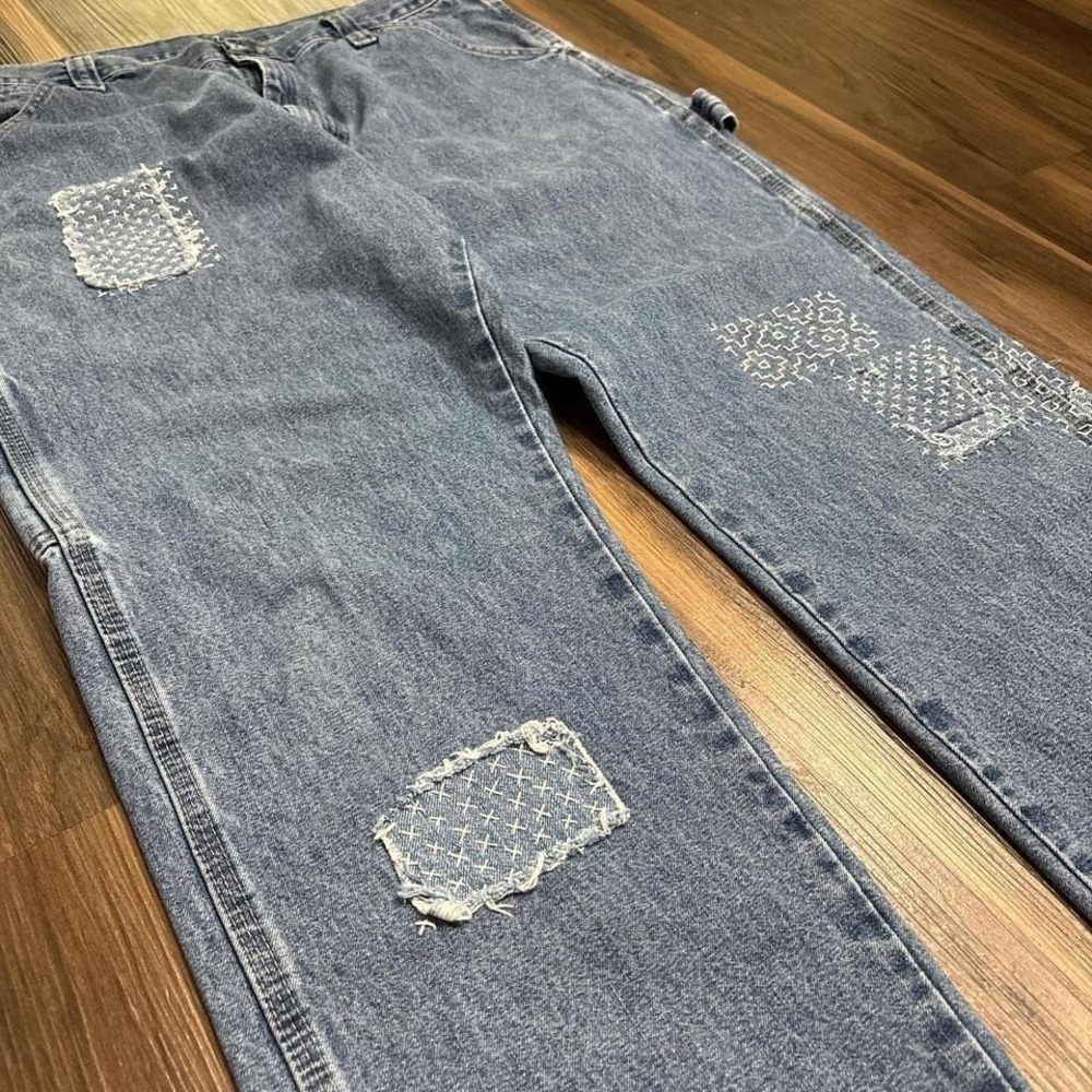 Wrangler baggy carpenter jeans with visible mending